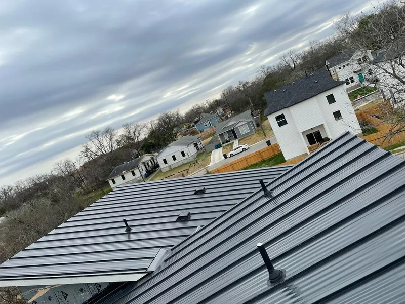 Standing seam metal roof panels with vents for Skylight Repair in Fairfax